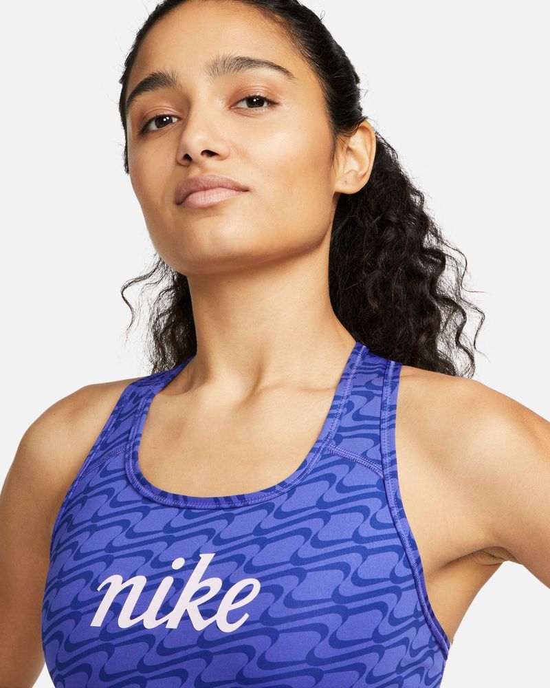 Calças Nike Swoosh Icon Clash de apoio médio, sem acolchoamento, com  estampado em todo o lado, azul - DQ5121-430